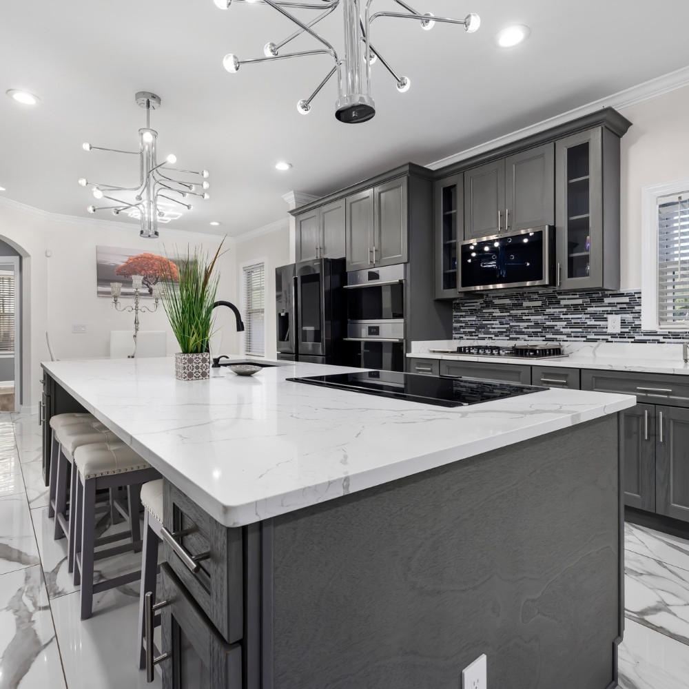Brand new kitchen remodel by Iron Crest with white cabinets quartz countertops and mountain view in Carbondale Colorado